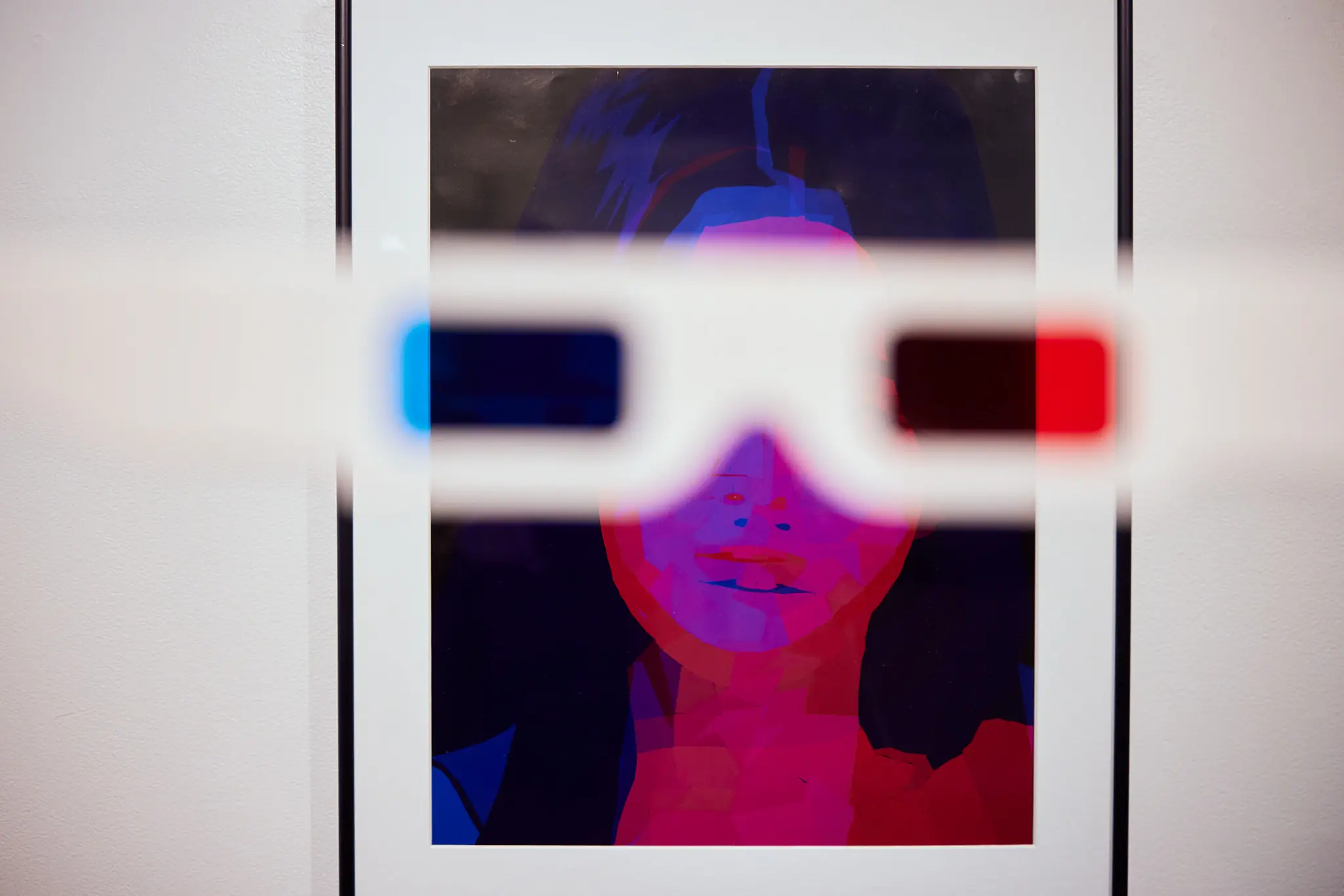 3d glasses in front of artwork