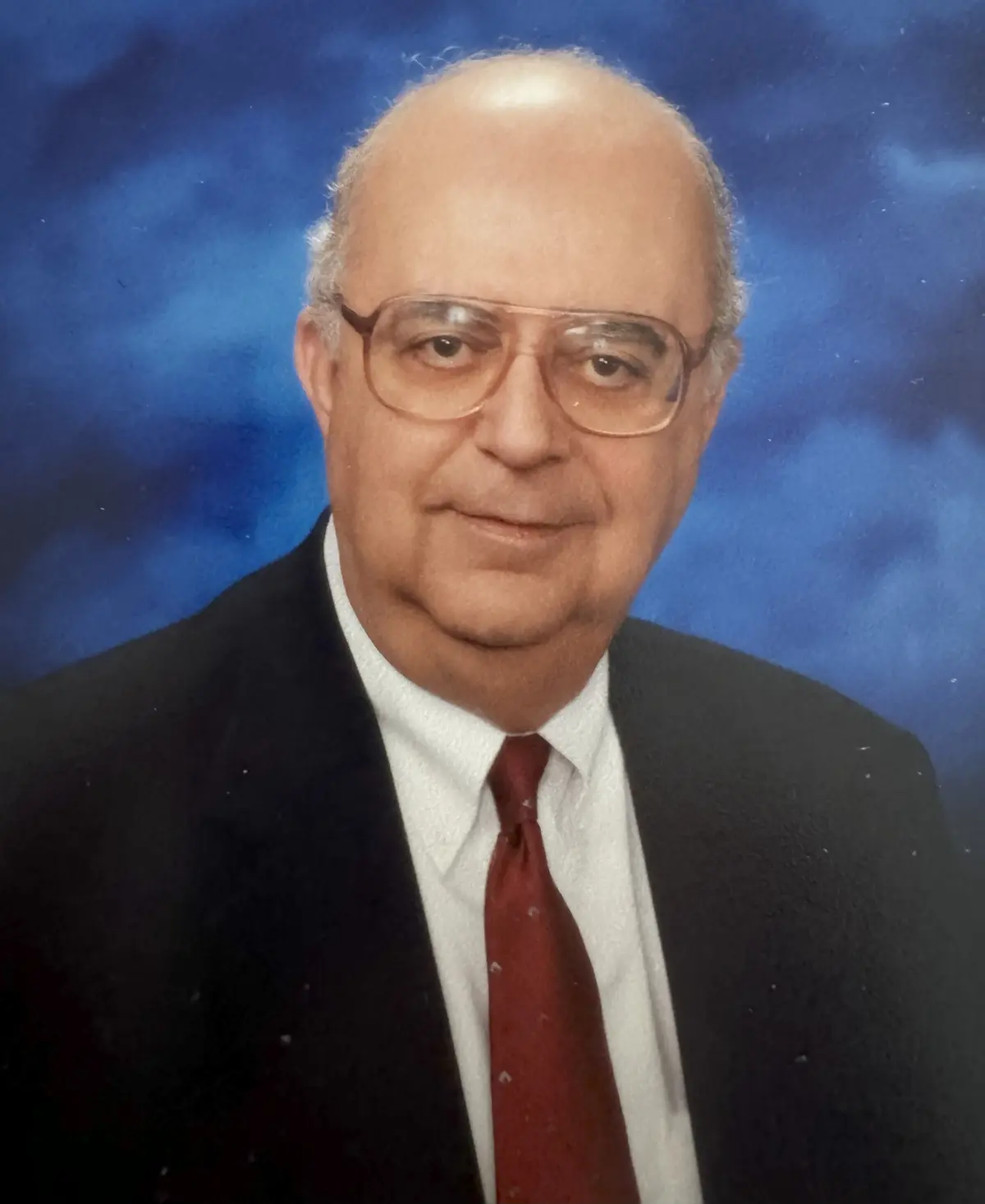 Portrait of an older man wearing glasses